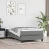 A bedroom scene with a bed, nightstand, and plant. Voir les images du produit