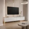 A modern living room with a white, high-gloss TV cabinet and a large flat-screen TV mounted on the wall. Produktbild-Vorschau