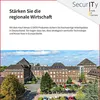 A marketing image featuring text and a large building with a parking lot. Produktbild-Vorschau