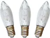 Three clear, ribbed candle-shaped light bulbs with silver bases are arranged diagonally against a white background. Produktbild-Vorschau