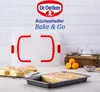 A Dr. Oetker Bake & Go baking container with a cake and oranges in the background. Anteprima dell’immagine prodotto