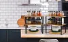 Two tiered kitchen counter shelves holding spice jars and bowls. Produktbild-Vorschau