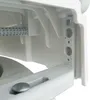 A close-up view of the internal structure of a toilet seat riser, showing mounting brackets and a textured roller. Produktbild-Vorschau