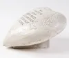 A heart-shaped stone with engraved text and floral designs, resting on a stone base. Produktbild-Vorschau