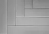 A close-up, abstract view of gray decorative foam panels arranged in a geometric pattern. Podgląd zdjęcia produktu