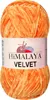 A ball of orange velvet yarn with a label. Podgląd zdjęcia produktu