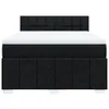 A studio shot of a black boxspring bed with a white mattress on a white background. Produktbild-Vorschau