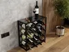 A wine rack filled with wine bottles, placed next to a wall and a plant. Podgląd zdjęcia produktu