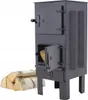 A black metal wood-burning stove with a small door open, revealing a piece of wood inside. A stack of firewood is placed to the left of the stove. Náhled obrázku produktu