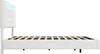 Side view of a white bed frame with a tufted headboard and LED lighting. Produktbild-Vorschau