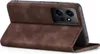 A brown flip cover case for a smartphone is shown from a side angle, with the cover partially open. Produktbild-Vorschau