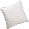 A white pillow with a wavy quilted pattern, shown at an angle against a white background. Produktbild-Vorschau