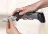 Hands holding and demonstrating a SKIL Multi Cutter. Produktbild-Vorschau