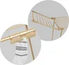 Close-up views of a gold-colored drying rack, showing details of its construction and how a sock is hung on it. Produktbild-Vorschau