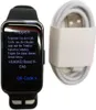 A smartwatch displaying pairing instructions next to its charging cable. Produktbild-Vorschau