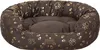 A brown oval dog bed with a gold paw print pattern. Podgląd zdjęcia produktu