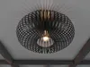 A black, modern ceiling light fixture with a woven metal shade, mounted on a white ceiling. Náhled obrázku produktu