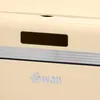 A close-up view of a cream-colored kitchen appliance, likely a bread bin or bin, with a silver stripe and the brand name 'Swan' embossed below. Náhled obrázku produktu