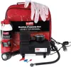 A tire repair kit with a compressor, spray, and flashlight, laid out on a white background. Produktbild-Vorschau