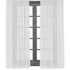 A pair of white sheer curtains hanging in front of a dark-framed window. Produktbild-Vorschau