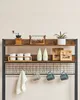 Kitchen shelf with various items like coffee grinder, jars, bottles, bags, and mugs. Náhled obrázku produktu