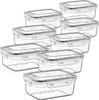 A set of clear plastic food storage containers with gray clip-on lids, arranged in a staggered formation against a white background. Produktbild-Vorschau
