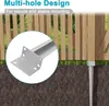 A close-up view of a metal fence post anchor being installed into the ground next to a wooden fence. Produktbild-Vorschau