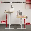 Two standing desks are shown at different heights, illustrating the adjustable range. Voir les images du produit