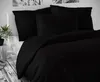 A black duvet cover and pillow set on a bed with a white headboard and light wooden floor. Náhled obrázku produktu