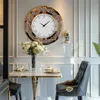 A dining table setting with a clock on the wall. Podgląd zdjęcia produktu
