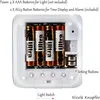 The back of a digital alarm clock showing the battery compartment and instructions for battery installation. Produktbild-Vorschau