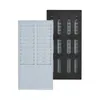 Two time card racks, one gray and one black, are shown against a white background. Náhľad obrázku produktu