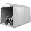 Two motorcycles are parked inside a silver-grey tent-like garage structure. Podgląd zdjęcia produktu