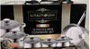 The image shows the packaging of a cookware set, with the product itself visible through the packaging. Anteprima dell’immagine prodotto