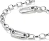 A close-up shot of a silver charm bracelet. Anteprima dell’immagine prodotto