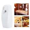 A collage showing an automatic air freshener dispenser and lifestyle images of its potential use in a bathroom, hotel room, and restaurant. Produktbild-Vorschau