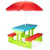 A colorful children's picnic table with benches and a red umbrella. Podgląd zdjęcia produktu