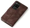 A brown leather flip case for a smartphone is shown against a white background. Produktbild-Vorschau