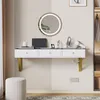A white floating vanity with gold legs and a round mirror with LED lighting. Voir les images du produit