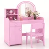 A pink children's vanity set with a mirror, drawers, cabinet, and a stool, displayed against a white background. Podgląd zdjęcia produktu