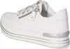 A white sneaker with a platform sole and silver accents is shown from the side. Voir les images du produit