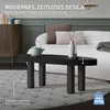 A modern living room scene featuring a coffee table with decorative items, a sofa, and a cabinet. Produktbild-Vorschau