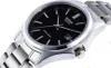 A close-up shot of a Casio men's watch with a black dial and stainless steel band. Produktbild-Vorschau