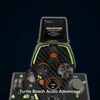 Close-up of a gaming controller with a screen displaying audio modes. Produktbild-Vorschau