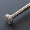 A close-up shot of the end of a telescopic rod, likely a shower curtain rod, against a dark gray background. Produktbild-Vorschau