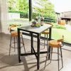 A bar table and stools set in a modern dining area with a view of a garden. Náhľad obrázku produktu