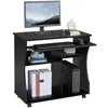 A black computer desk with a monitor, keyboard, mouse, computer tower, and books. Podgląd zdjęcia produktu