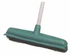 A close-up studio shot of a green rubber broom with a white handle against a white background. Produktbild-Vorschau