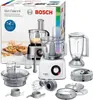 A product shot of a Bosch food processor and its accessories, displayed on a white background with the product's packaging visible. Produktbild-Vorschau