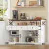 A kitchen sideboard with various items on display, including a coffee maker, mugs, jars, and appliances. Podgląd zdjęcia produktu